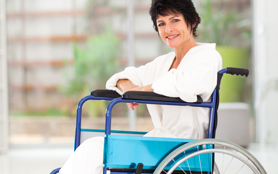 disabled middle aged woman sitting on wheelchair