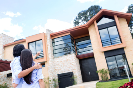 Couple looking at a house